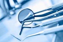 dentist's instruments with shallow depth of field blue tinted